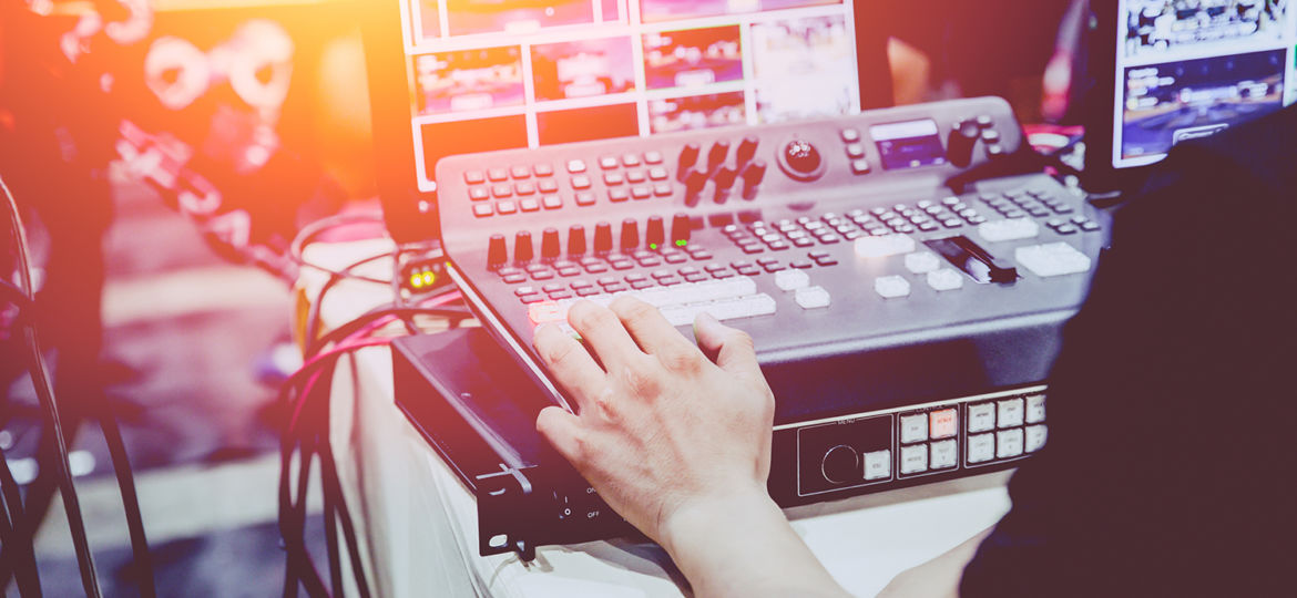 Professional video editor footage switching on stage duty vintag