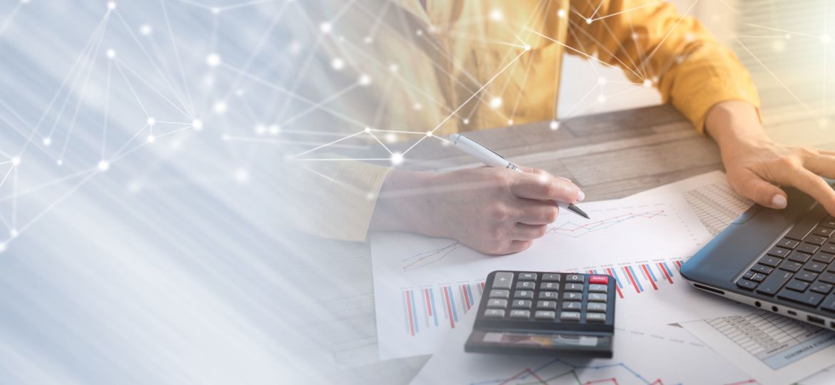 Accountant working on laptop; light effect