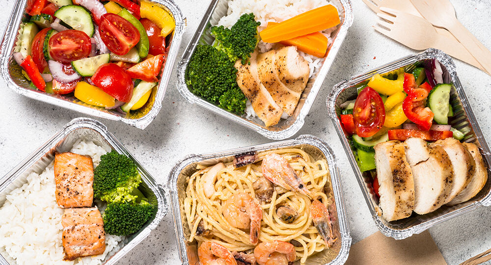 Food delivery concept - healthy lunch in boxes.